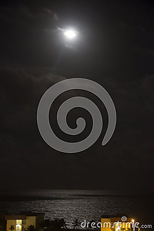 Moonlight over some buildings in Naples Florida Stock Photo