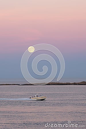 Moonrise over the Pacific ocean Stock Photo