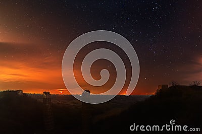 A moonrise photography. A fallen bridge ruins landscape. Starry Sky background Stock Photo