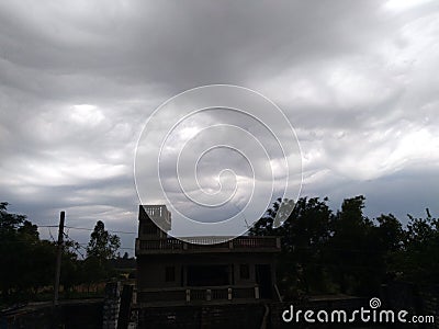 Moonsoon rainy clouds in Mohangarh village india Stock Photo