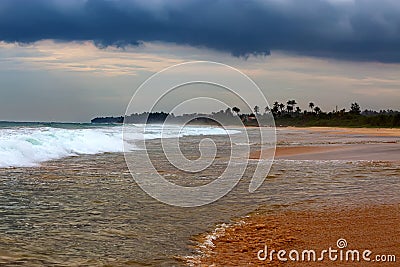 Moonsoon on a beach of a tropical island Stock Photo