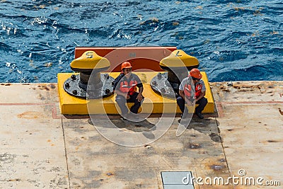 Mooring gang and port workers in Cozumel, Mexico Editorial Stock Photo