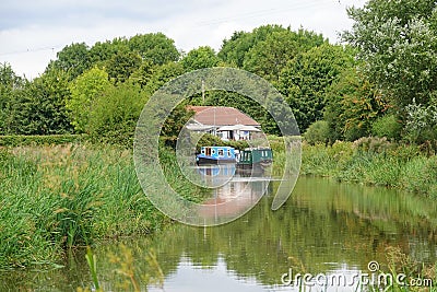 Moorings and tearoom on English canal Editorial Stock Photo