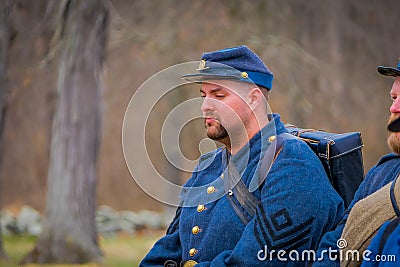 MOORPARK, USA - APRIL, 18, 2018: Close up of group of men wearing blue uniform representing the Civil War Reenactment in Editorial Stock Photo