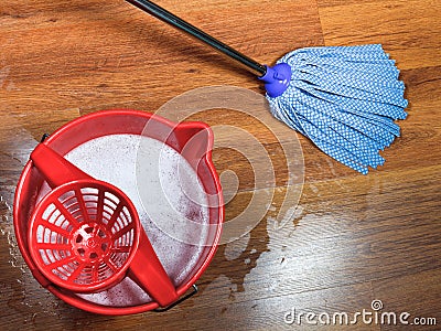 Mopping of wooden floors Stock Photo