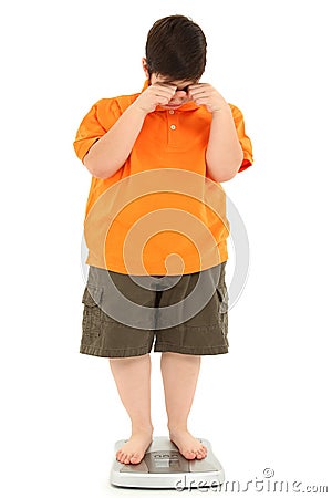 Morbidly Obese Fat Child on Scale Stock Photo