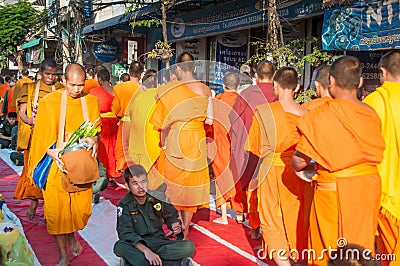More monks with give alms bowl which came out of the offerings in the morning at Buddhist temple, Culture Heritage Site Editorial Stock Photo