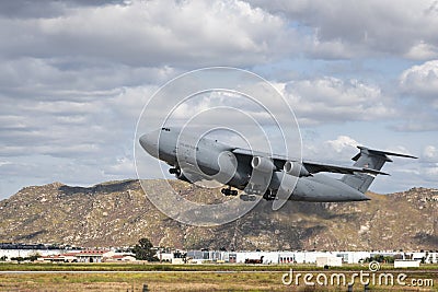 Moreno Valley, CA, USA - May 3, 2023: A U.S. Air Force C-5 Galaxy departing from March AFB. Editorial Stock Photo