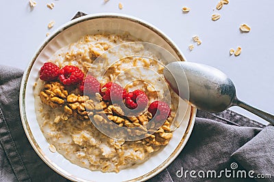 Morning breakfast, oatmeal in milk with berries Stock Photo