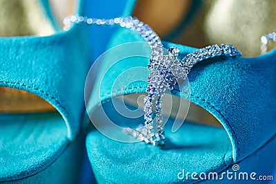 Morning of the bride. Wedding accessories and turquoise shoes Stock Photo