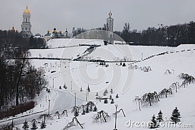 Morning in city. View to the National Museum `Memorial to Holodomor victims` and Great Lavra Bell Tower. Winter landscape. Kyiv. U Stock Photo