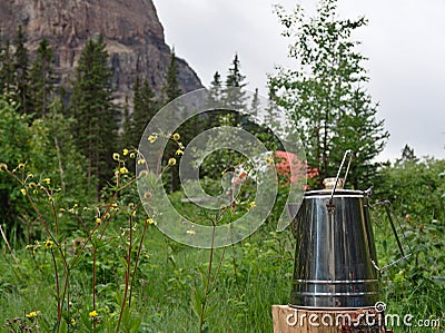 Morning Coffee While Camping in the Mountains Stock Photo