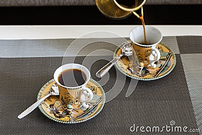 Morning coffee in cups with a beautiful Egyptian design. Stock Photo