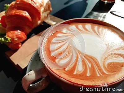 Morning coffee with homemade croissant, breakfast with cappuccino and croissant Stock Photo