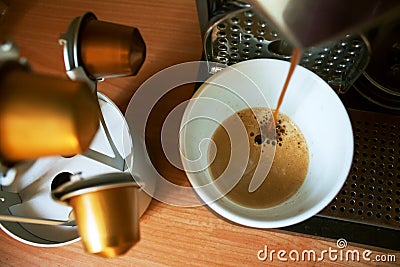 Morning fragrant coffee with nespresso machine. Stock Photo