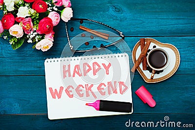 Morning coffee and text in notepad: Happy weekend Stock Photo