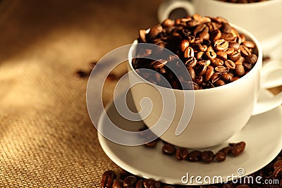 Morning cups of coffee, full of beans. Stock Photo