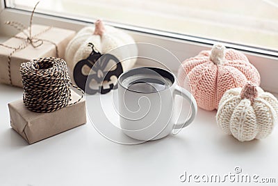 Morning in the day of Halloween, preparation of gifts for the holiday on the windowsill. Stock Photo