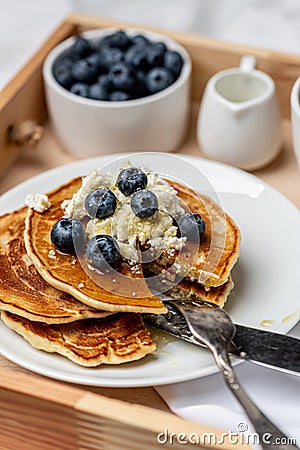 Morning delight with sweet blueberry pancakes and strong coffee Stock Photo