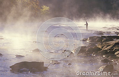 Morning fishing in fog on Housatonic River, Northwestern CT Stock Photo