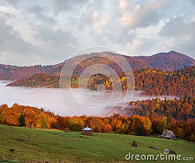 Morning foggy clouds in autumn mountain countryside. Ukraine, Carpathian Mountains, Transcarpathia Stock Photo