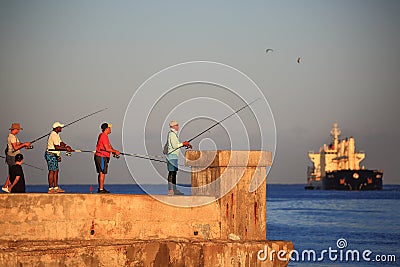 Morning in Havana. Fishermen on the pier Editorial Stock Photo