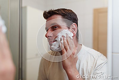 Morning hygiene, Happy guy is ready to shave Stock Photo