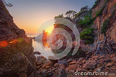 Morning landscape in sea bay of rocky coast. Scenery sea nature at sunrise. Amazing view on rocks and sea on spanish beach Stock Photo