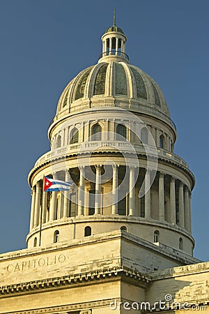 Morning light on the Capitolio and Cuban Flag, the Cuban capitol building and dome in Havana, Cuba Stock Photo