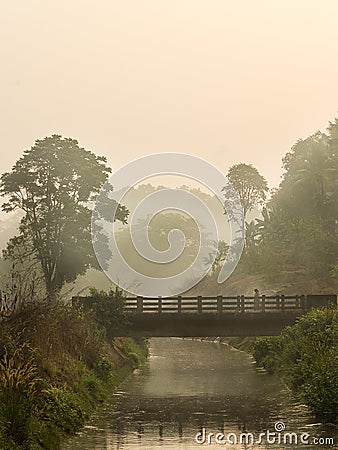 Morning light Swiping the mist away Stock Photo