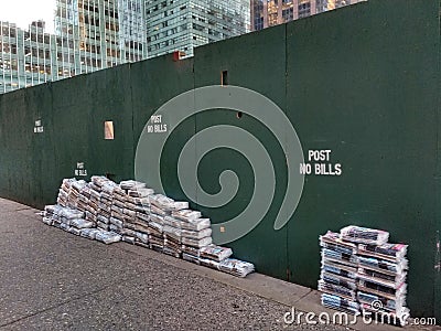 Morning Newspapers and Magazines Stacked Near Grand Central Terminal, Post No Bills, New York City, NY, USA Editorial Stock Photo