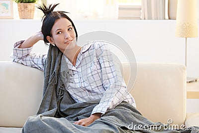 Morning portrait of pyjama girl with blanket Stock Photo