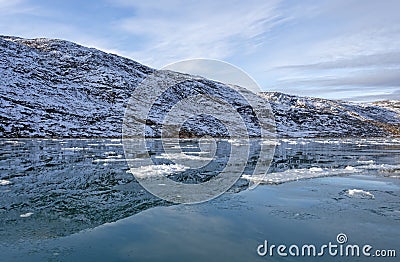 Morning Reflections in a Glacial Fjord Stock Photo