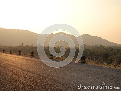 In the morning ,road on dam in Thailand Stock Photo