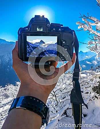 Beautiful morning with fresh snow with my camera and mountain view Stock Photo