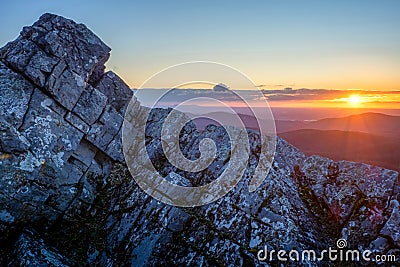 Morning sun kisses the Little Carpathians montain peaks. Stock Photo