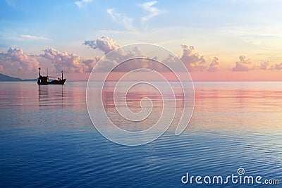 Morning sunrise pink sky, blue sea, white clouds, ship silhouette, scenery landscape, soft color sunset on ocean coast, Thailand Stock Photo