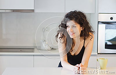 Morning woman in the kitchen Stock Photo