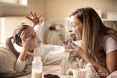 Funny breakfast in bed Stock Photo