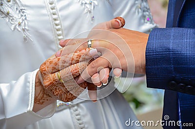 A Moroccan bride wears her grooms wedding ring. Stock Photo