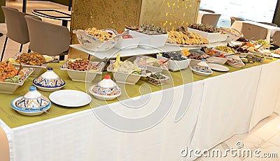 Moroccan buffet, traditional Moroccan food, tagine, chebakia, and Arabic sweets Stock Photo