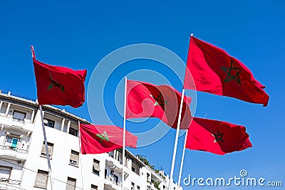 Moroccan flags against a blue sky in Morocco Stock Photo