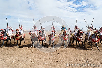 Moroccan horse riders in Fantasia performance Editorial Stock Photo