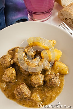 Moroccan kefta tajine meatballs on served on a table. Stock Photo