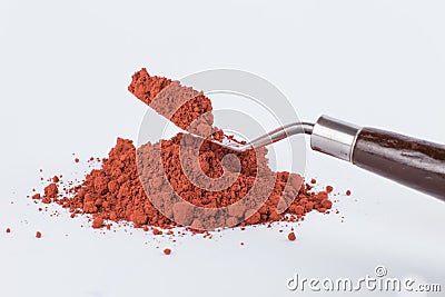 Moroccan Ochre pigment on a white background Stock Photo