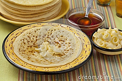 Moroccan pancakes with butter and honey Stock Photo