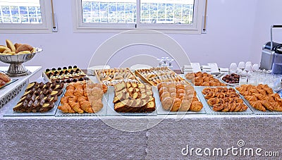 Moroccan pastries buffet, sweets, cake, croissants, dates and milk Stock Photo