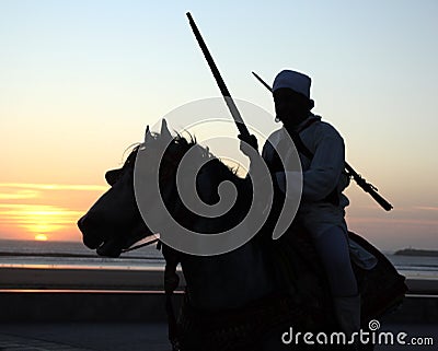 Moroccan Rider at sunset Editorial Stock Photo