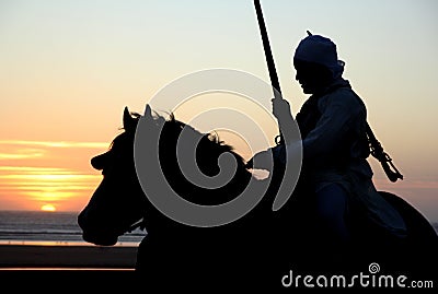 Moroccan Rider at sunset Editorial Stock Photo