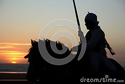 Moroccan Rider at sunset Editorial Stock Photo